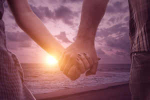 200 x 300 relationship retreat hands shaped in heart, framing the sun
